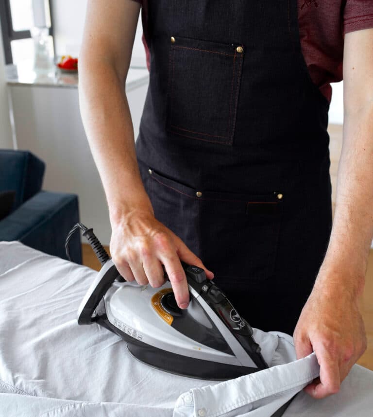 Man Ironing shirt
